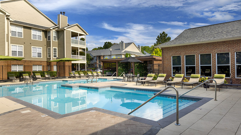 Pool with Expansive Sundeck and Lounge Seating